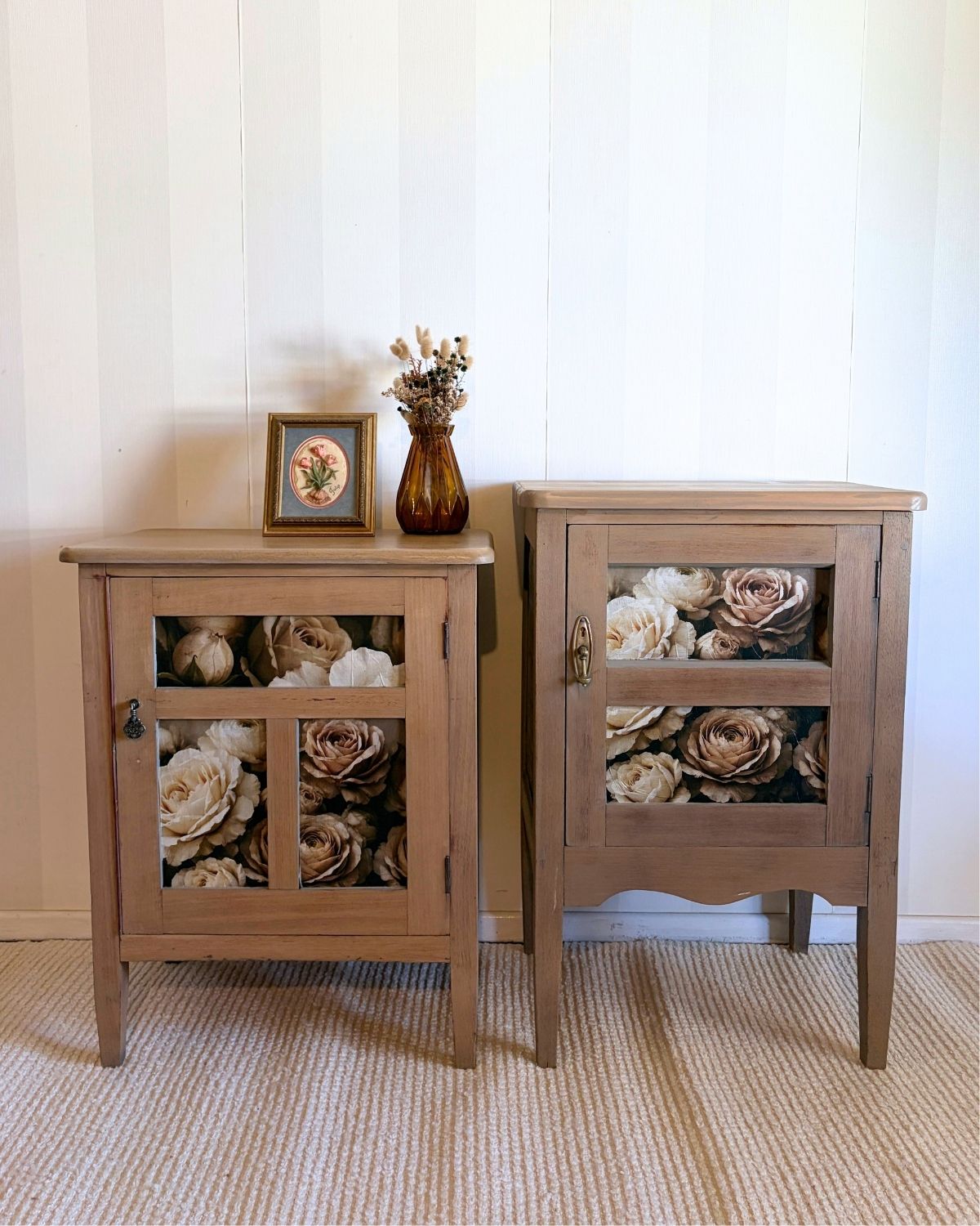 Coordinating antique hardwood bedside tables with a neutral tan finish and floral decoupage